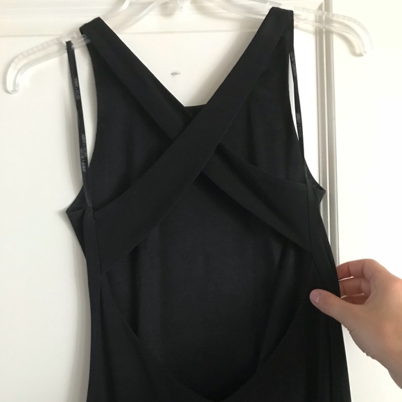 Floor-length black, open-back dress. - Picture 4 of 5